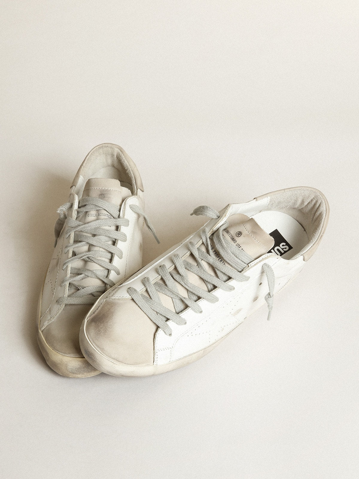 Golden Goose Super-Star Uomo con Stella Traforata e Talloncino Grigio Ghiaccio