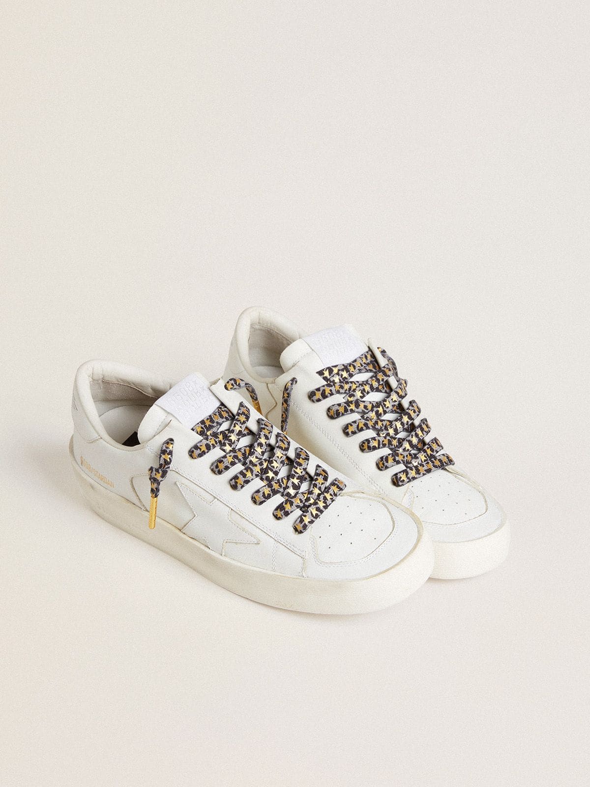 Golden Goose Lacci con stampa animalier grigia e nera con stelline dorate a contrasto
