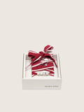 Golden Goose Skins laccio a righe bianche e rosse con charm applicati