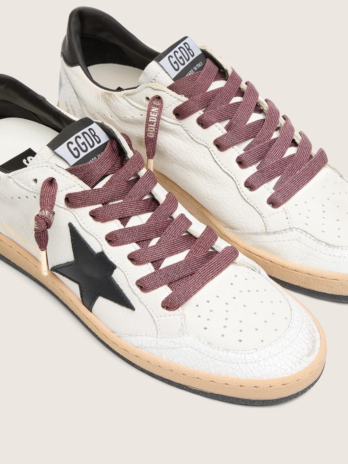 Golden Goose Laccio bordeaux con dettagli oro