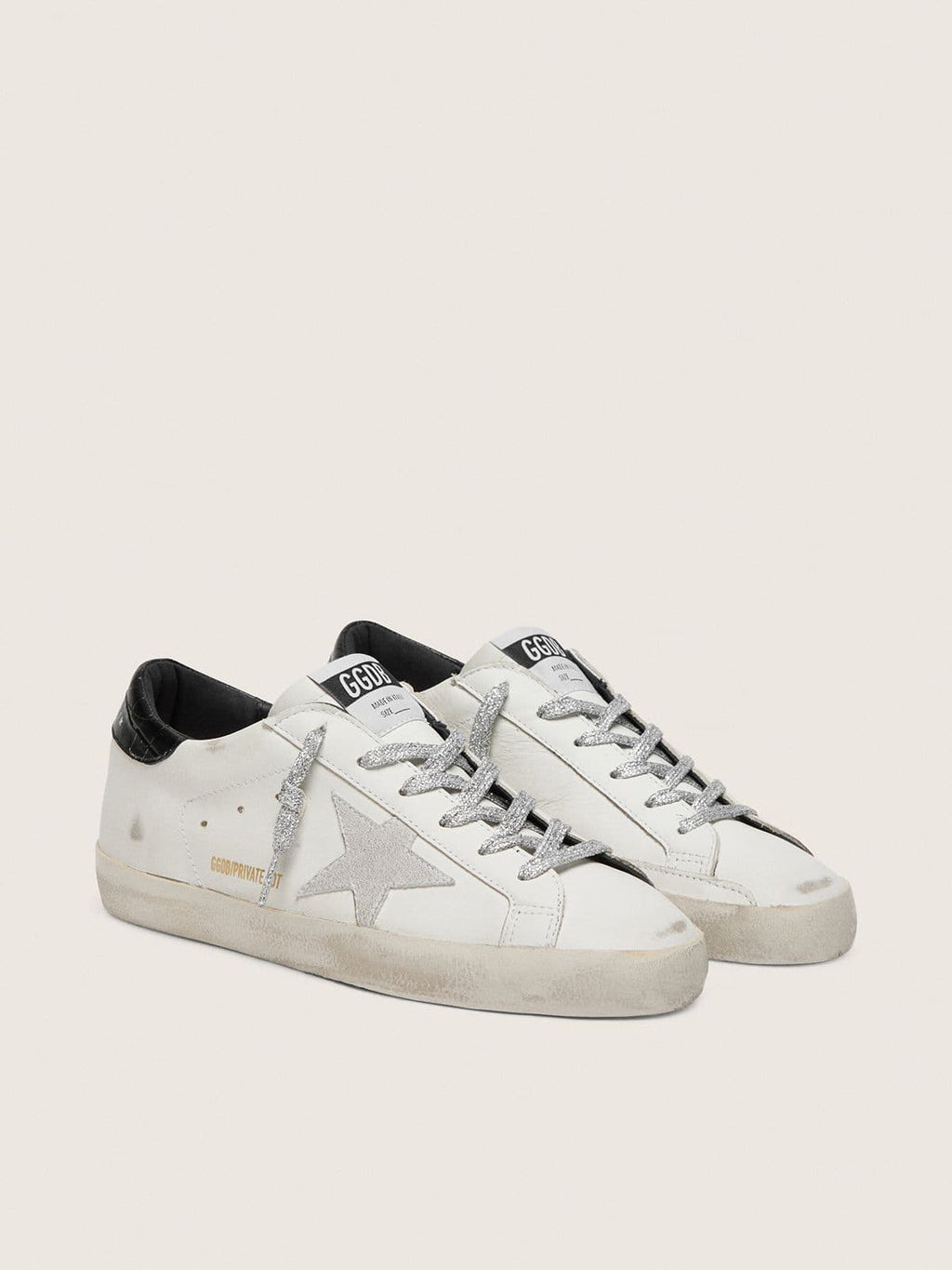 Golden Goose Super-Star Donna con Stella in Suede Bianco e Talloncino in Pelle Cocco Nera