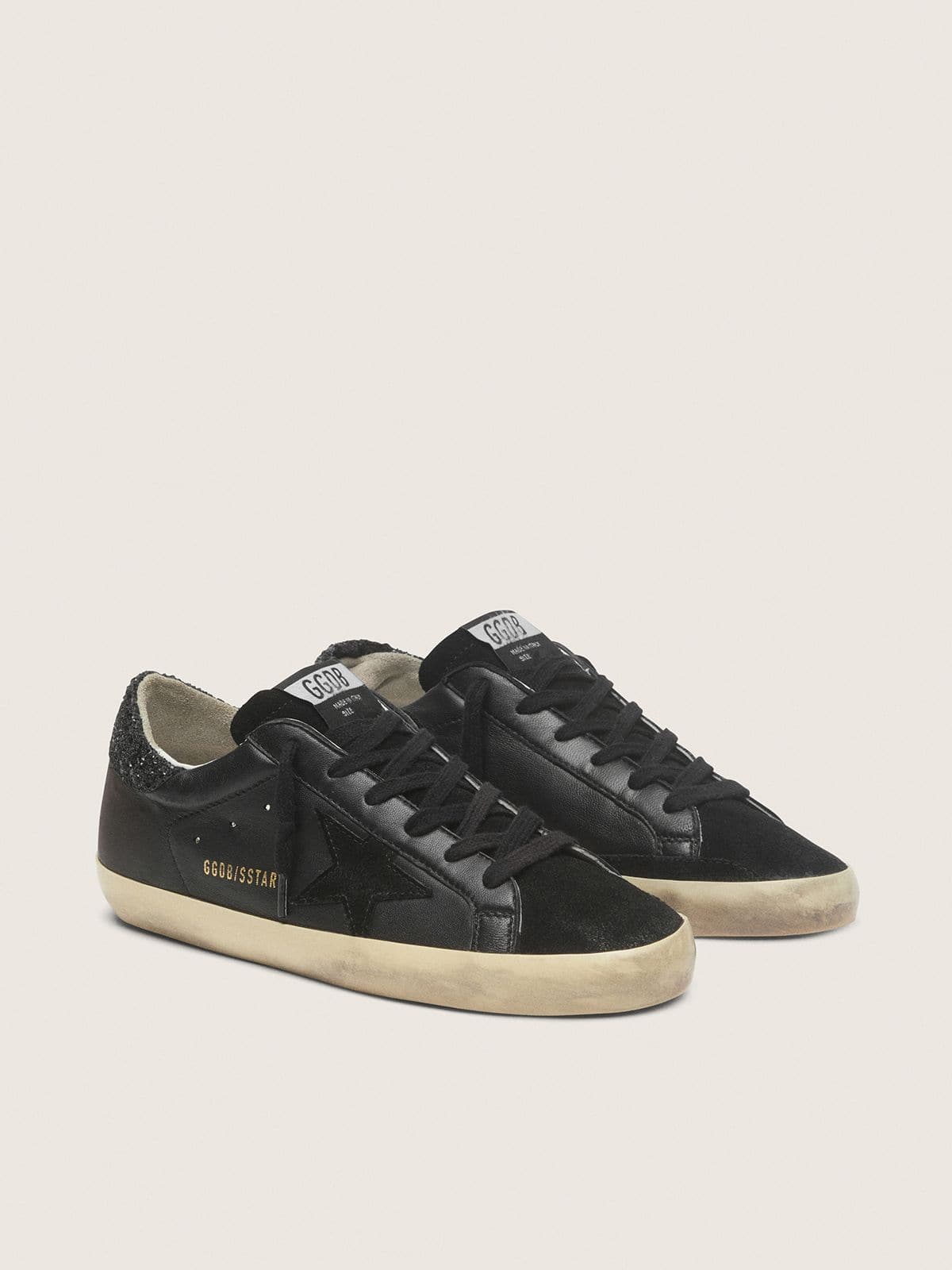Golden Goose Super-Star Donna in Nappa Nera con Stella in Suede Nero e Talloncino in Glitter Neri