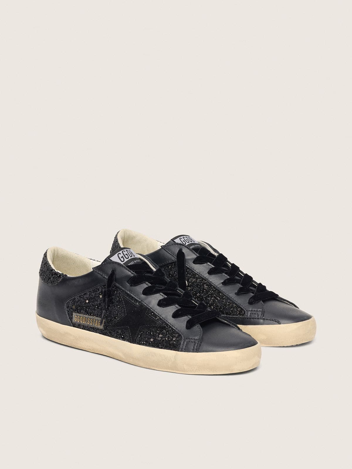 Golden Goose Super-Star Donna in Glitter Neri con Stella in Suede Nero e Inserti in Pelle