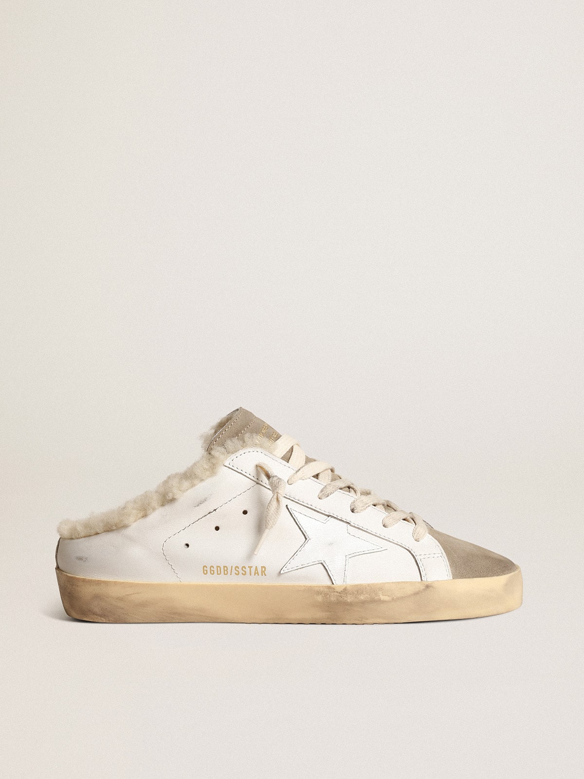 Golden Goose Super-Star Sabot con Stella in Pelle Bianca e Fodera in Shearling