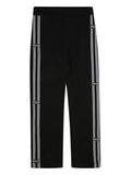 Pantaloni da tuta per bambina MSGM Kids nero con banda laterale – Accessorio premium elegante