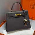 Hermes Kelly Bag Ebony Gold Epsom Leather – Accessorio premium elegante